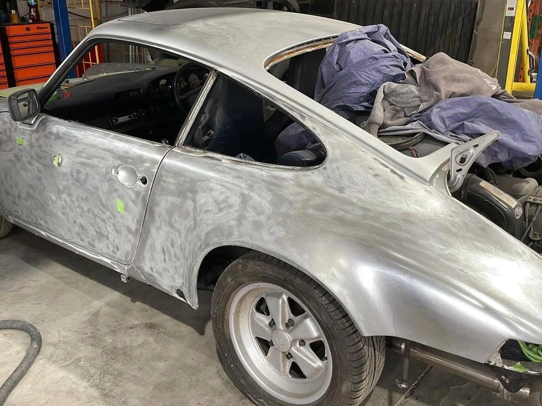 Porsche 911 stripped bodywork during restoration