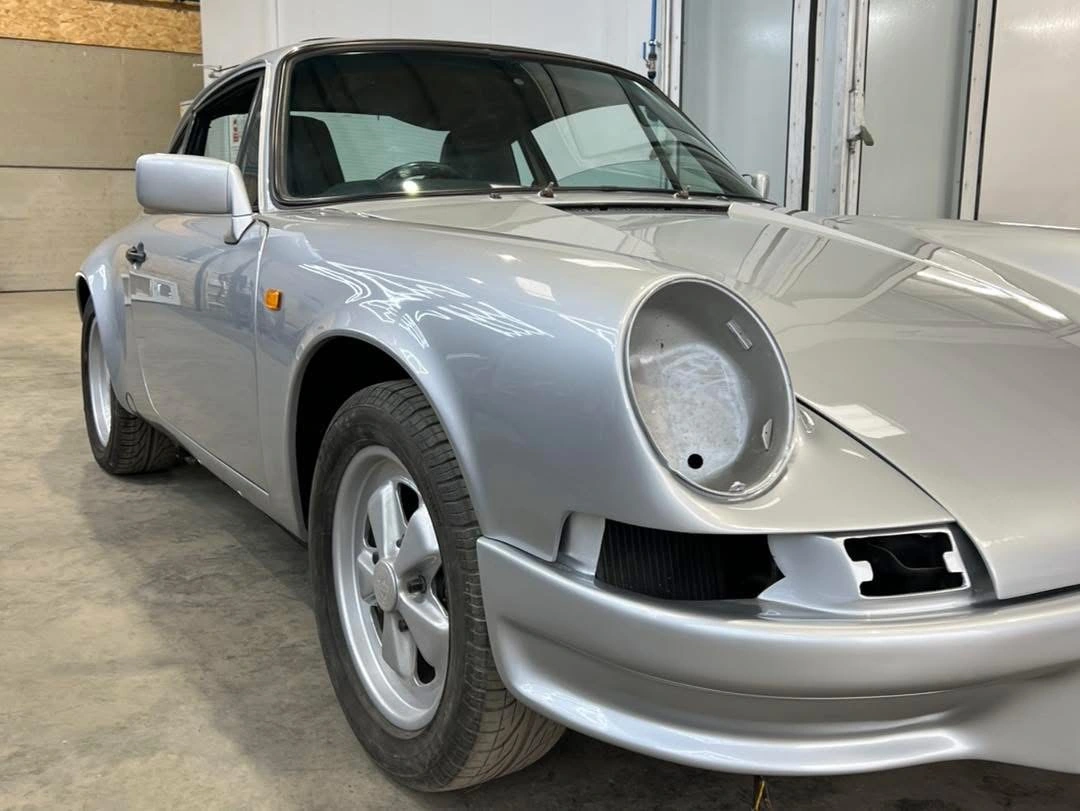 Porsche 911 with glossy Diamond Silver paintwork at JB Bodyworks